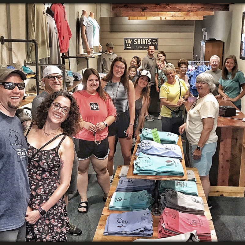 Fun people visiting Roth Shirt Co. shop in downtown Traverse City, Michigan